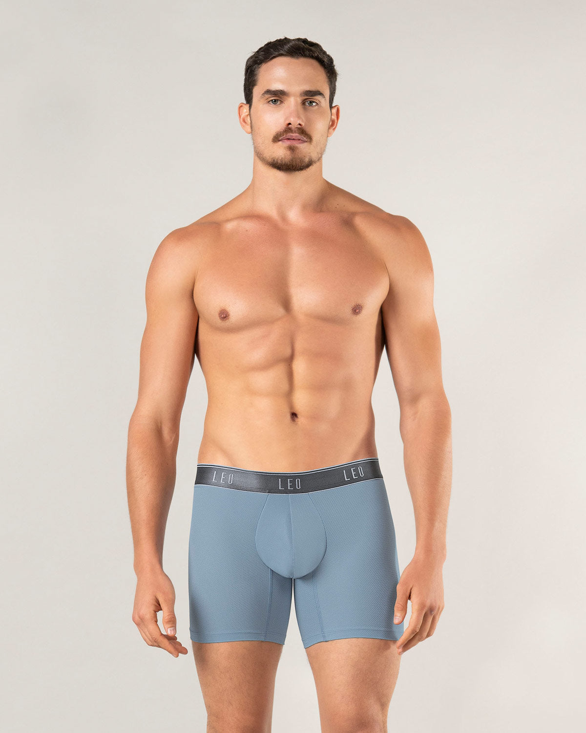 mid-length-boxer-brief-with-ergonomic-design#color_055-stone-blue-with-gray-elastic